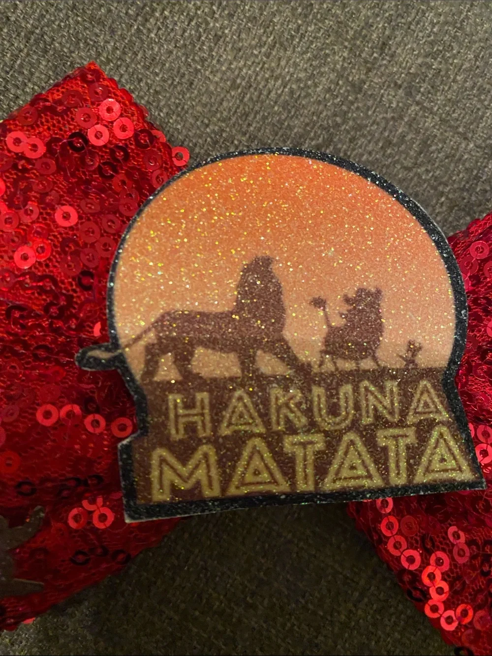 Disney Lion King Hakuna Matata Sequin Bow Ear Headband - Red & Yellow